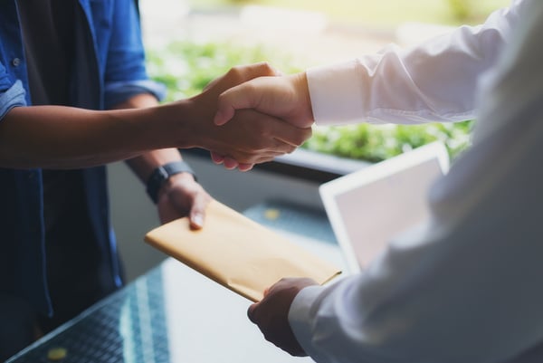 Image of a Businessman Negotiating a Joint Financial Transaction